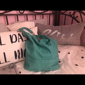 Kenneth Cole 
Beautiful authentic bag